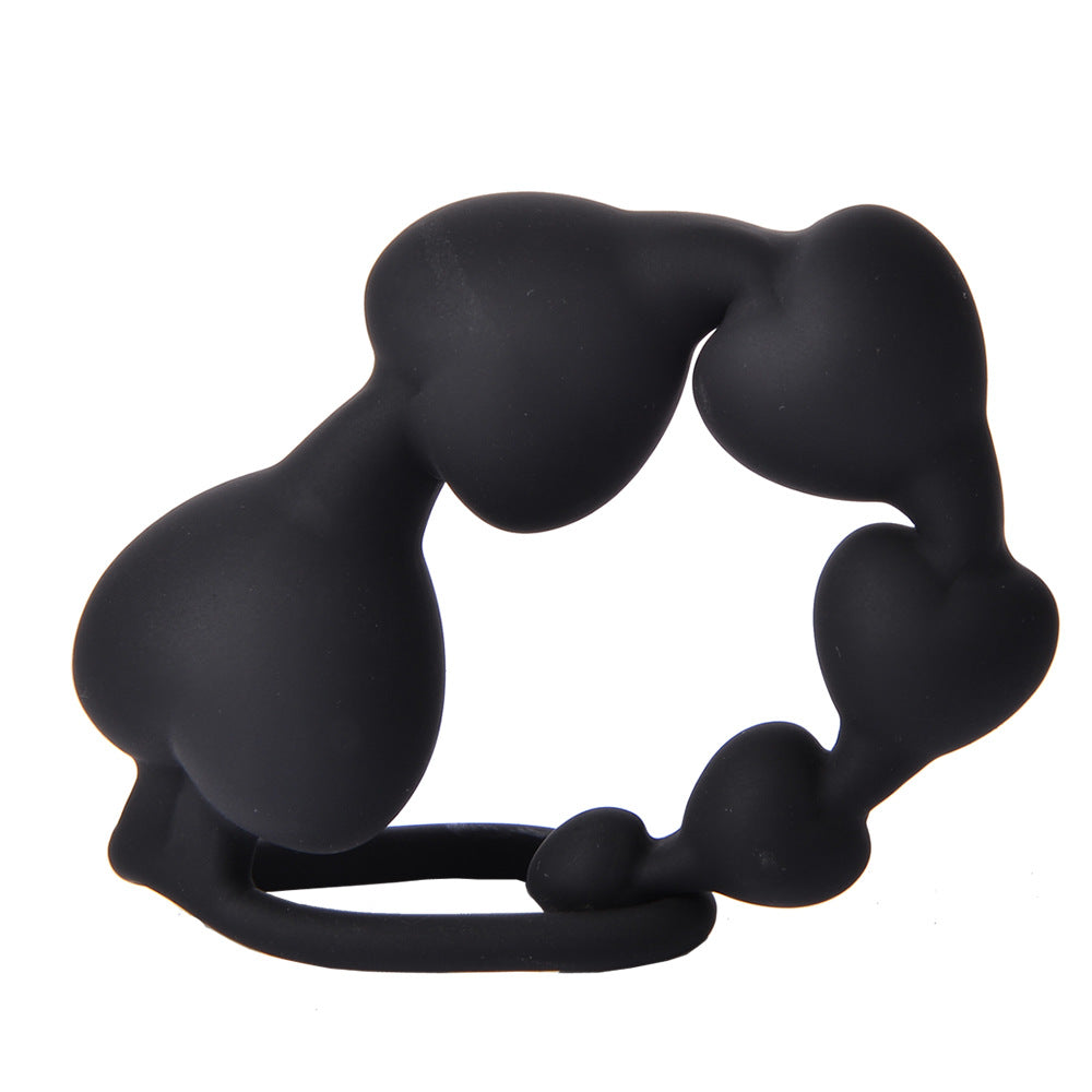 Pleasurez-merkkiinen sydämen muotoinen anaalihelmi, näkyvissä läpinäkyvä ja pehmeä materiaali, ergonominen muoto.